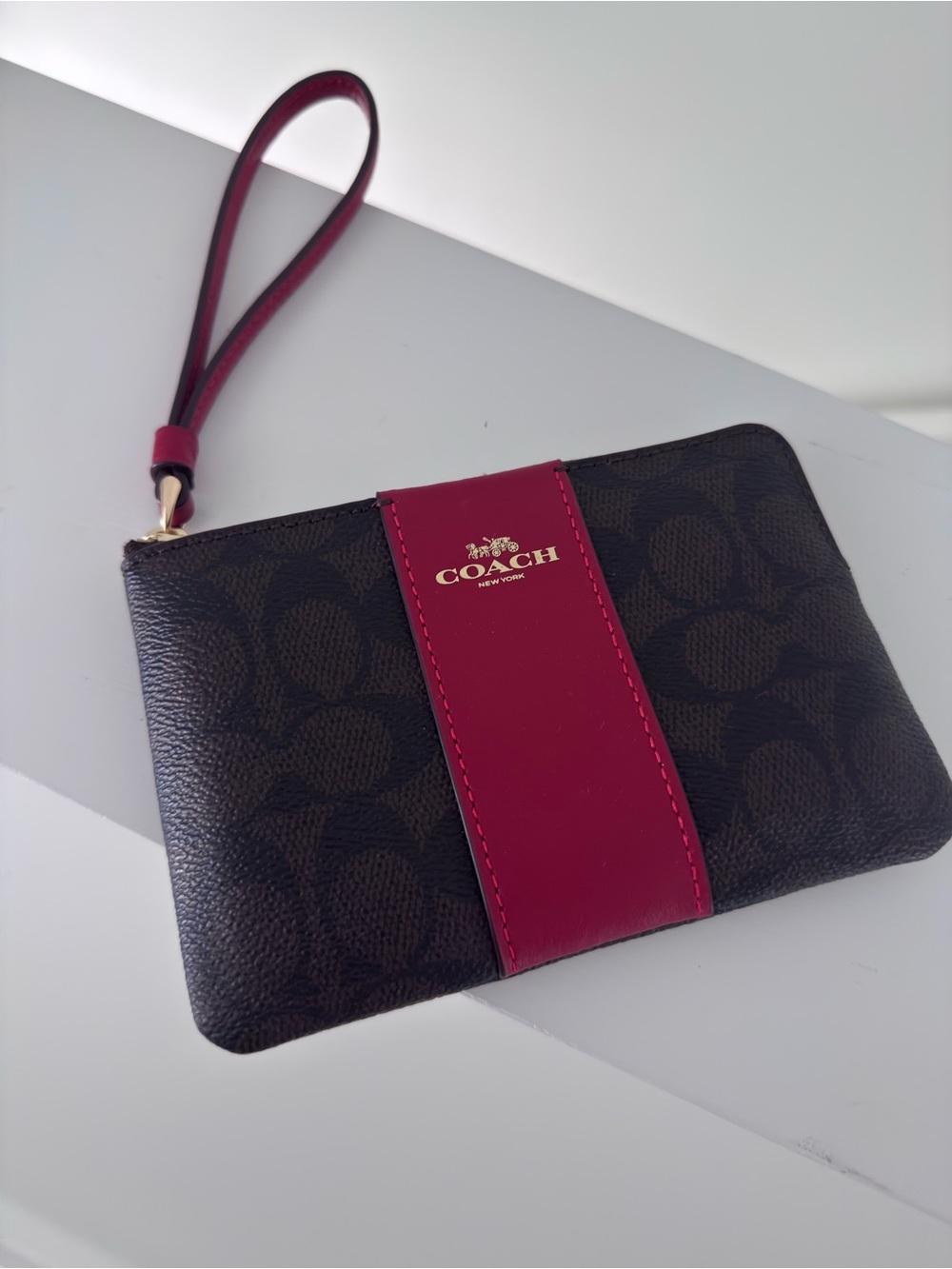 Coach Brown Signature Wristlet with Berry Pink Stripe